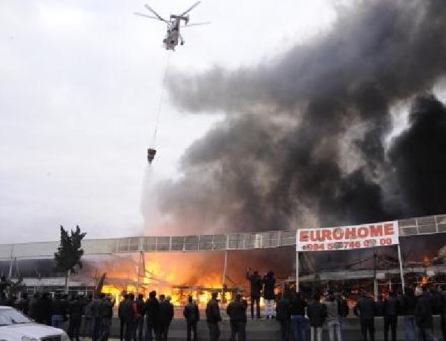 "EuroHome”da yanğının söndürülməsinə 3 helikopter cəlb edilib