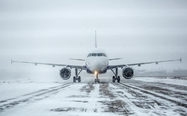 Yaponiyada 1 metrədək qar yağdı, 100-dən çox aviareys təxirə salındı