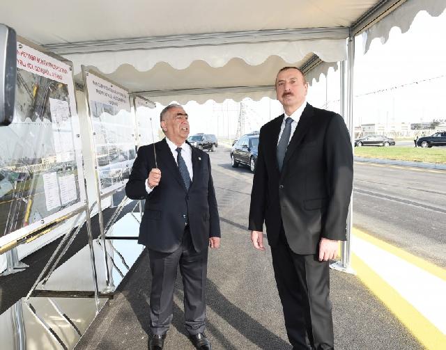 İlham Əliyev Olimpiya Stadionu ətrafındakı müxtəlif səviyyəli yol qovşağının açılışında iştirak edib